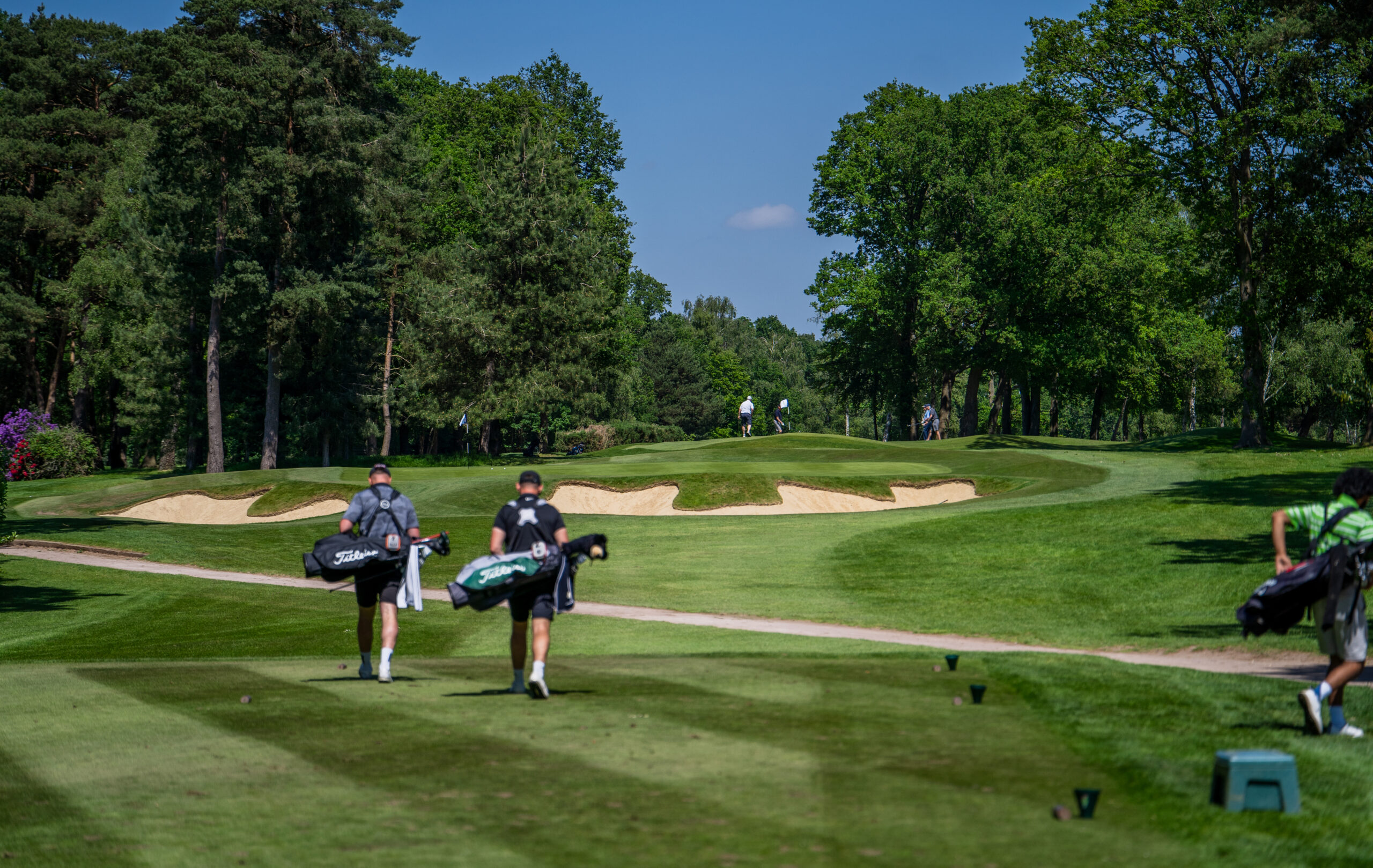 4 Golfers walking off the tee at West Byfleet